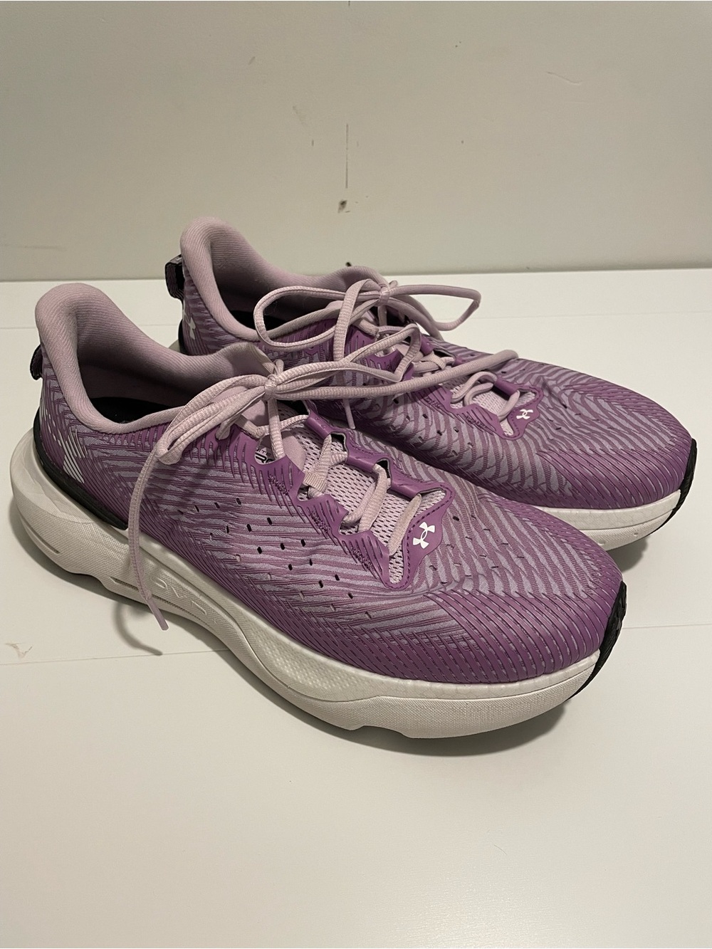 Under Amrour Brand Women's size 12 Purple & White Infinite 6 Running Shoe